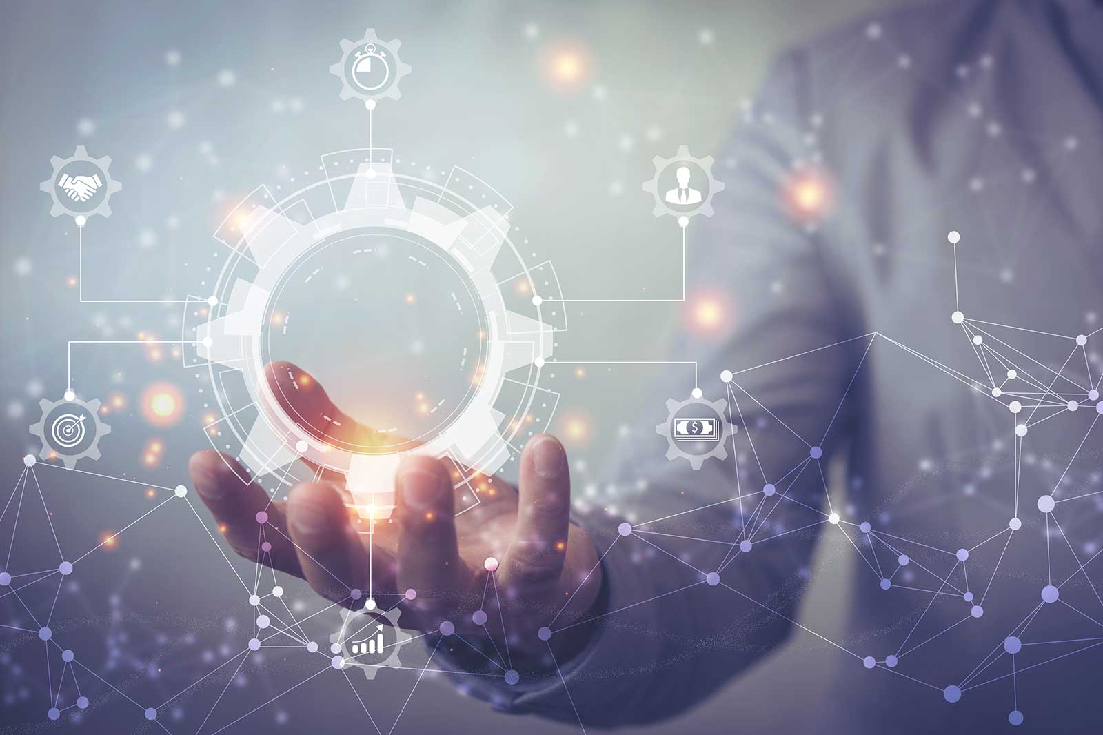 Een hand die naar een gloeiende tandwiel-symbool reikt, omringd door digitale iconen en netwerken, die technologie en innovatie vertegenwoordigen.